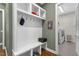 Functional mudroom with built-in storage, hooks, and a convenient bench at 4201 Henderson Pl, Pittsboro, NC 27312