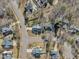 Aerial view of a residential neighborhood, showing houses and streets from above at 4205 Winding Oak Way, Apex, NC 27539