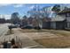 Two-story house on a residential street with other homes visible at 4409 Lake Ridge Dr, Raleigh, NC 27604