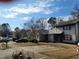 Two-story house on a residential street with other homes visible at 4409 Lake Ridge Dr, Raleigh, NC 27604