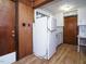 A kitchen view showing a refrigerator, a kitchen sink, and doors at 504 Washington St, Raleigh, NC 27605
