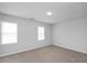 Bright bedroom with neutral walls and carpet at 5321 Baywood Forest Dr, Knightdale, NC 27545