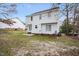 Two story house with white siding and a backyard at 5321 Baywood Forest Dr, Knightdale, NC 27545