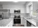Updated kitchen with stainless steel appliances and granite countertops at 5321 Baywood Forest Dr, Knightdale, NC 27545