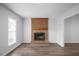 Living room with brick fireplace and hardwood floors at 5321 Baywood Forest Dr, Knightdale, NC 27545