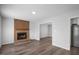 Living room featuring a brick fireplace and hardwood floors at 5321 Baywood Forest Dr, Knightdale, NC 27545