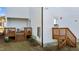 Home features a deck with stairs, perfect for outdoor relaxation at 547 Vine Pkwy, Pittsboro, NC 27312