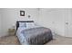 Cozy bedroom with a plush rug and a neutral color scheme at 547 Vine Pkwy, Pittsboro, NC 27312