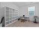 Spacious bedroom with built-in shelving and workspace at 547 Vine Pkwy, Pittsboro, NC 27312