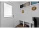 White entryway with built-in bench, cubbies, and shoe storage at 547 Vine Pkwy, Pittsboro, NC 27312