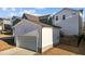 Detached garage with driveway and exterior lighting at 547 Vine Pkwy, Pittsboro, NC 27312