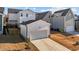 White detached garage with a wide driveway at 547 Vine Pkwy, Pittsboro, NC 27312