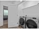 Bright laundry room with modern washer and dryer at 547 Vine Pkwy, Pittsboro, NC 27312