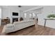 Open living area featuring a sectional sofa and fireplace at 547 Vine Pkwy, Pittsboro, NC 27312