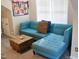 Cozy bonus room with sectional sofa and coffee table at 626 Churton Grove Blvd, Hillsborough, NC 27278