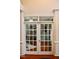 French doors leading to home office with built-in shelves at 626 Churton Grove Blvd, Hillsborough, NC 27278