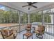 Relaxing screened porch with wooded backyard views at 63 Eastland Ct, Smithfield, NC 27577