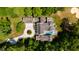 Bird's-eye view of house, pool, and circular driveway at 805 Pinehurst Dr, Chapel Hill, NC 27517