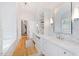 Elegant bathroom with marble finishes and double vanity at 805 Pinehurst Dr, Chapel Hill, NC 27517