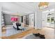Elegant dining room features hardwood floors, a large table, and modern lighting at 805 Pinehurst Dr, Chapel Hill, NC 27517