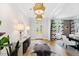 Spacious entryway with hardwood floors and a view into the dining room at 805 Pinehurst Dr, Chapel Hill, NC 27517