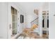 Elegant entryway with tile floor and built-in storage at 805 Pinehurst Dr, Chapel Hill, NC 27517