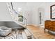 Grand entryway with hardwood floors and statement staircase at 805 Pinehurst Dr, Chapel Hill, NC 27517