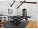 Game room with pool table, shuffleboard, and bar at 805 Pinehurst Dr, Chapel Hill, NC 27517