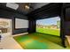 State-of-the-art golf simulator with ample space for practice at 805 Pinehurst Dr, Chapel Hill, NC 27517