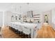 Spacious kitchen with a large island and white cabinets at 805 Pinehurst Dr, Chapel Hill, NC 27517