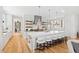 Spacious kitchen with large island and white cabinetry at 805 Pinehurst Dr, Chapel Hill, NC 27517