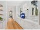 Butler's pantry with white cabinets and quartz countertops at 805 Pinehurst Dr, Chapel Hill, NC 27517