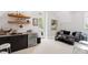Relaxing lounge area with wet bar and comfortable seating at 805 Pinehurst Dr, Chapel Hill, NC 27517