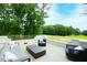 Relaxing outdoor patio overlooks a golf course at 805 Pinehurst Dr, Chapel Hill, NC 27517