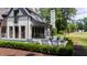Backyard oasis with a pool, patio furniture, and lush landscaping at 805 Pinehurst Dr, Chapel Hill, NC 27517