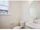 Modern bathroom with white vanity and oval mirror at 833 Parc Townes Dr # 17, Wendell, NC 27591