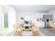 Modern dining room with an oval table and six chairs, near the kitchen at 858 Forth Ct, Gibsonville, NC 27249