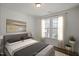 Comfortable bedroom with lovely natural light shining through large windows at Tbd Charlotte Knoll St # 13, Zebulon, NC 27597