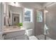 Bathroom featuring tile shower, vanity with sink, and modern finishes at 125 Charlotte Knoll St # 15, Zebulon, NC 27597