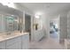 This bathroom boasts double sinks and provides direct access to the bedroom at 125 Charlotte Knoll St # 15, Zebulon, NC 27597