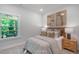 Cozy bedroom with plush carpet, natural light, and neutral decor at 125 Charlotte Knoll St # 15, Zebulon, NC 27597