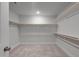 Large walk-in closet with custom shelving and ample storage space at 125 Charlotte Knoll St # 15, Zebulon, NC 27597