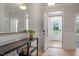 Stylish foyer with hardwood floors and modern accents, providing a warm welcome at 125 Charlotte Knoll St # 15, Zebulon, NC 27597