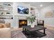 Cozy living room showcases a fireplace, built-in bookshelves, and comfortable seating at 125 Charlotte Knoll St # 15, Zebulon, NC 27597