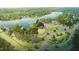 A beautiful aerial view showcasing a pool, lake, pier, clubhouse, and surrounding natural beauty at 116 Charlotte Knoll St # 7, Zebulon, NC 27597