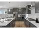 Open-concept kitchen featuring stainless steel appliances and a large center island at 116 Charlotte Knoll St # 7, Zebulon, NC 27597