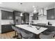 Beautiful kitchen features a large island, stainless steel appliances, and ample cabinet space at 116 Charlotte Knoll St # 7, Zebulon, NC 27597