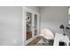 Bright office space featuring french doors, a modern chair, and a contemporary desk at Tbd Charlotte Knoll St # 7, Zebulon, NC 27597
