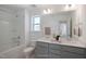 Bathroom boasts double vanity and a bathtub at 148 Charlotte Knoll St # 8, Zebulon, NC 27597