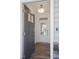 Gray front door opens to a light entryway with hardwood floors at 148 Charlotte Knoll St # 8, Zebulon, NC 27597
